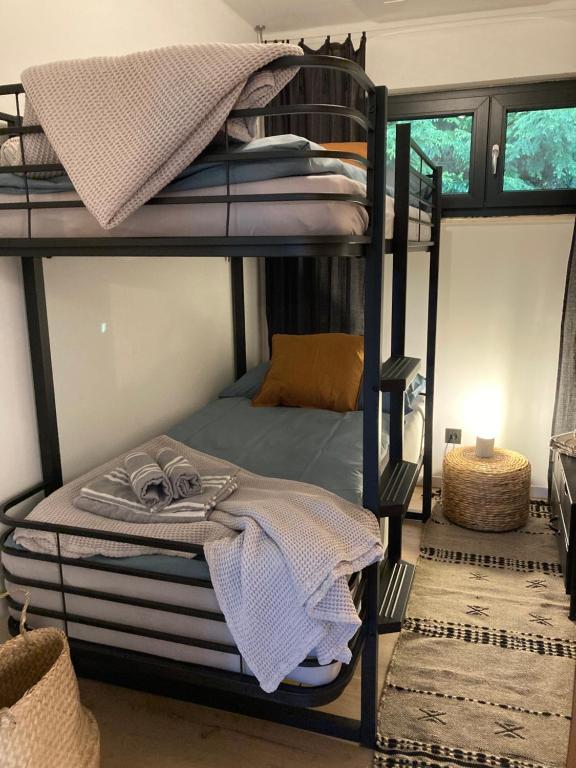 Posteľ alebo postele v izbe v ubytovaní DAS ERWIN Design-Bungalow (Nähe Velden/Wörthersee)