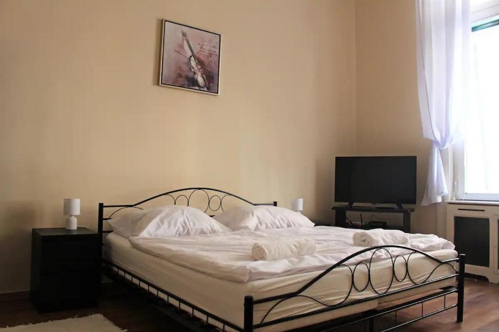 Postel nebo postele na pokoji v ubytování Sonnenberg-Villa Brunner Apartments
