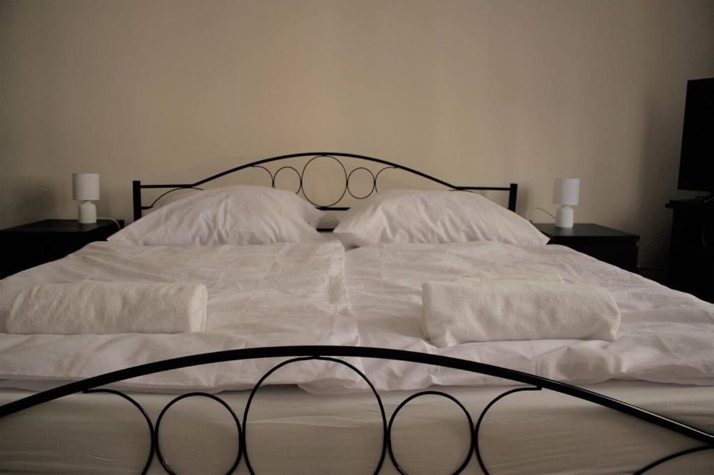 Postel nebo postele na pokoji v ubytování Sonnenberg-Villa Brunner Apartments