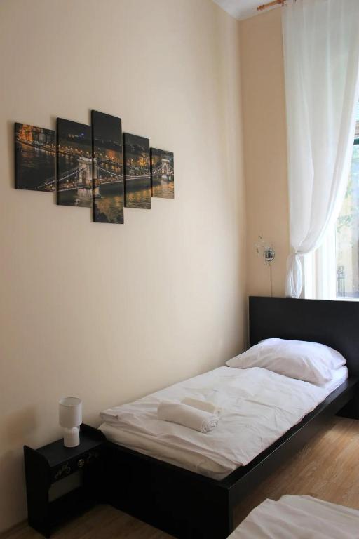 Postel nebo postele na pokoji v ubytování Sonnenberg-Villa Brunner Apartments