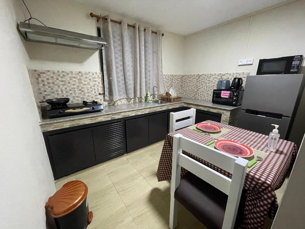 Kuchyň nebo kuchyňský kout v ubytování Tenexia - La Gaulette Studio