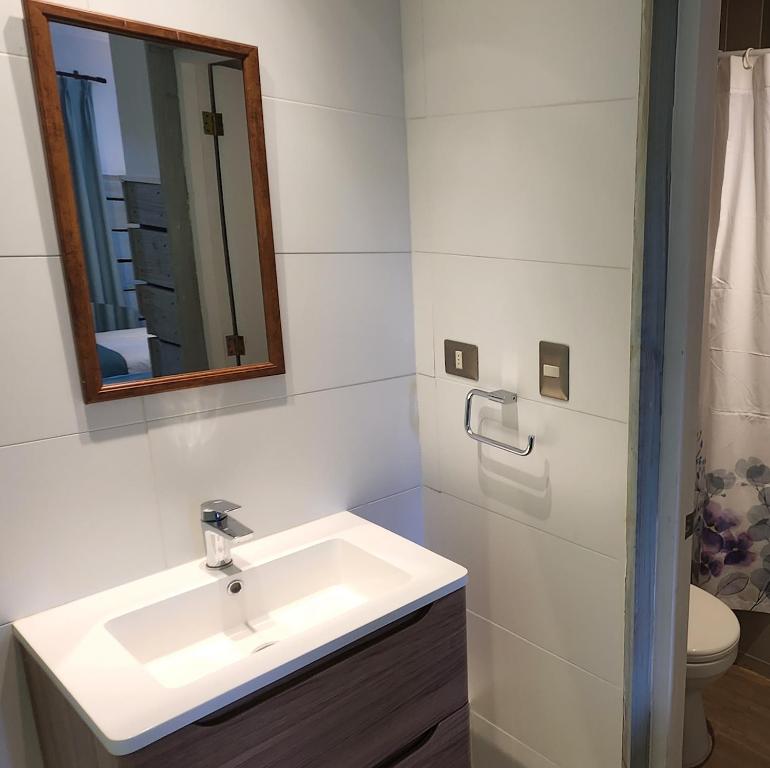 Koupelna v ubytování Apart Hotel Rapa Nui