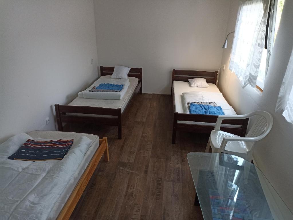 Postel nebo postele na pokoji v ubytování Chata Útěchov