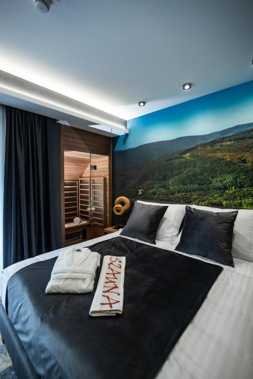 Posteľ alebo postele v izbe v ubytovaní 4 Évszak Erdeihotel**** - Mátrafüred