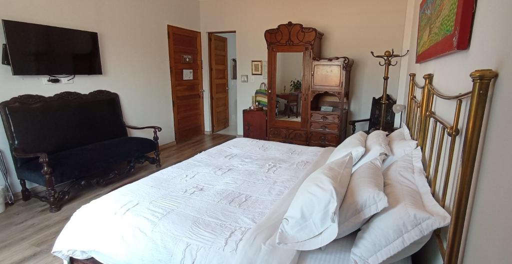 TV a/nebo společenská místnost v ubytování Hotel Don Alfonso