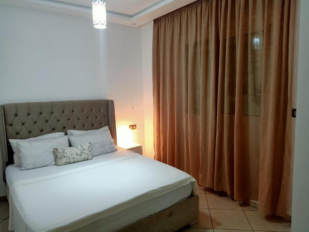 Postel nebo postele na pokoji v ubytování Appartement de luxe à deux pas de la mer