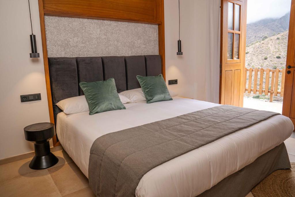 Postel nebo postele na pokoji v ubytování BASÂLTO Casas Rurales