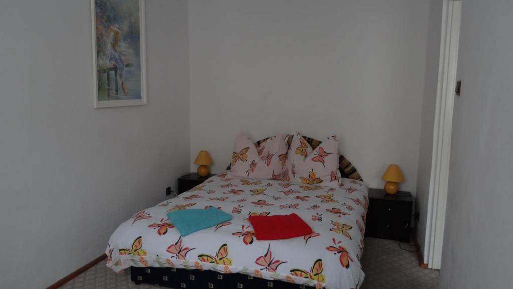 Postel nebo postele na pokoji v ubytování Ośrodek Wypoczynkowy "Hotel Korona"
