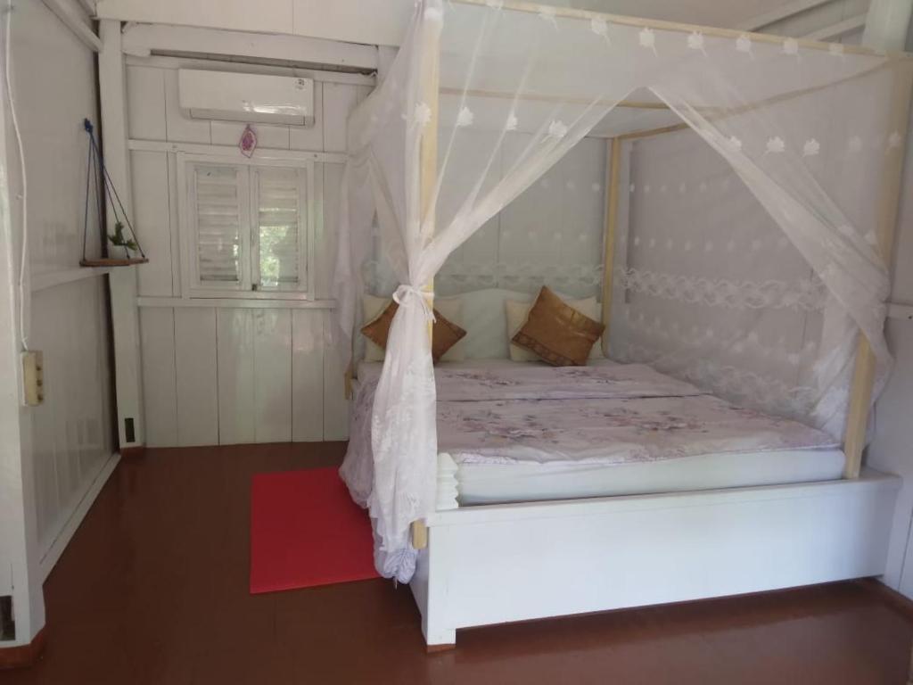 Postel nebo postele na pokoji v ubytování Scuba Republic Beach Bungalows