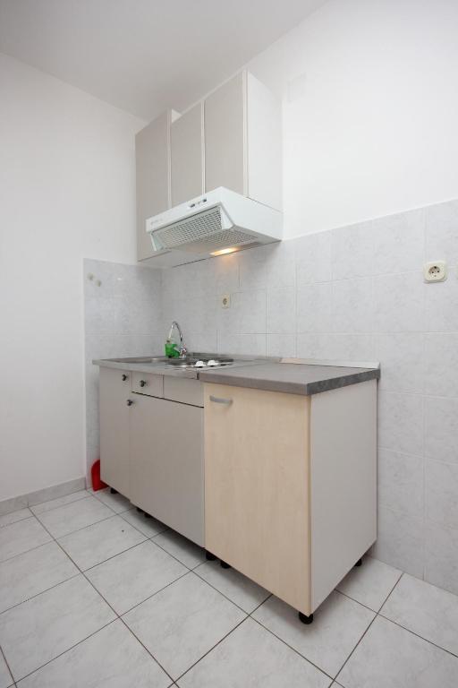 Kuchyň nebo kuchyňský kout v ubytování Apartment Vis 2470c