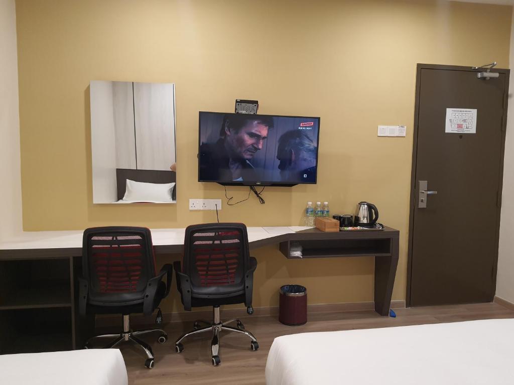 TV a/nebo společenská místnost v ubytování T SQUARE HOTEL (IPOH)