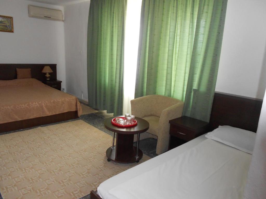 Postel nebo postele na pokoji v ubytování Hotel Cometa