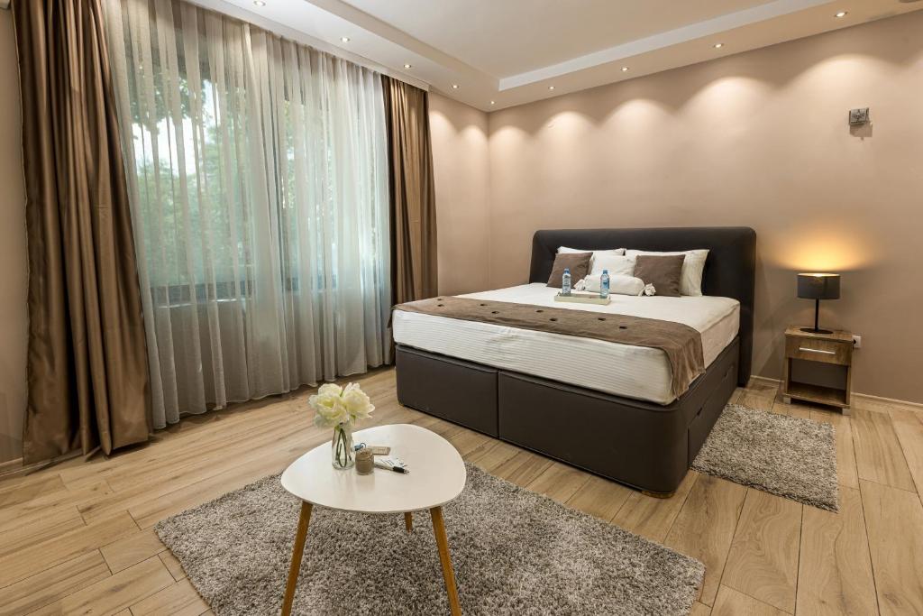 Postel nebo postele na pokoji v ubytování Annona Apartments