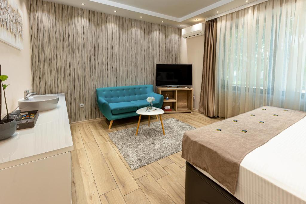 TV a/nebo společenská místnost v ubytování Annona Apartments