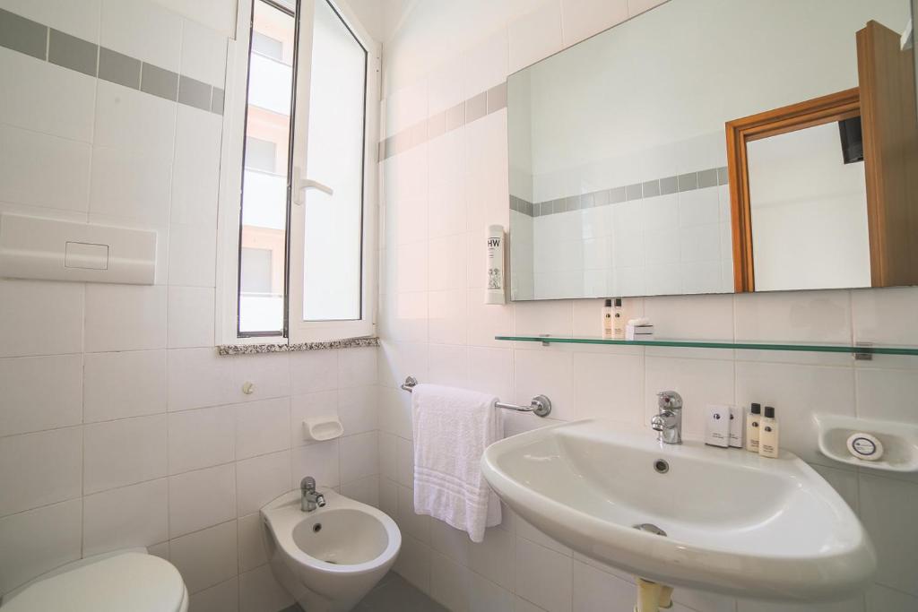 Koupelna v ubytování Hotel Ambasciatori