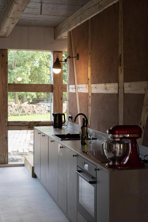 Kuchyň nebo kuchyňský kout v ubytování Tilia authentic home, butikowe apartamenty nad morzem