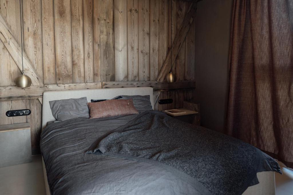 Postel nebo postele na pokoji v ubytování Tilia authentic home, butikowe apartamenty nad morzem
