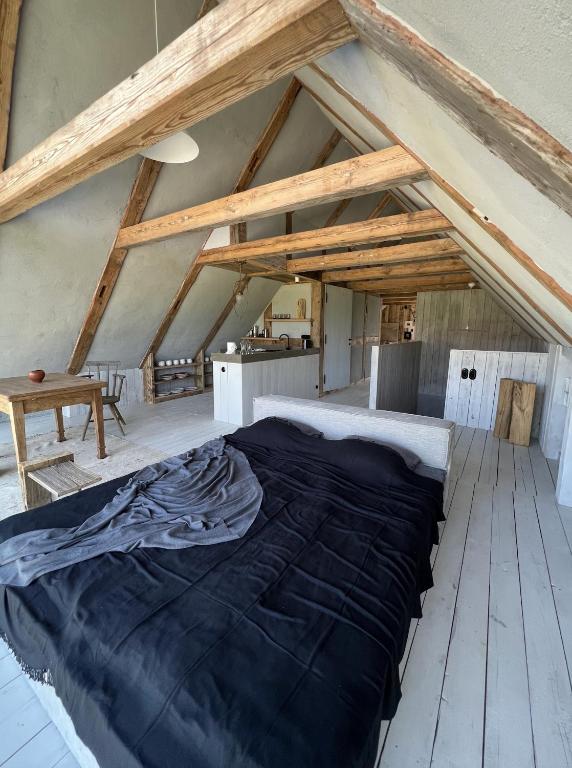 Postel nebo postele na pokoji v ubytování Tilia authentic home, butikowe apartamenty nad morzem