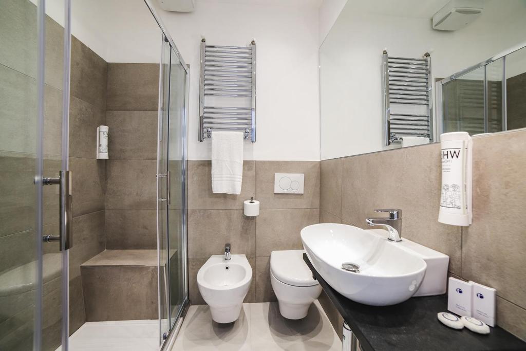 Koupelna v ubytování Hotel Ambasciatori