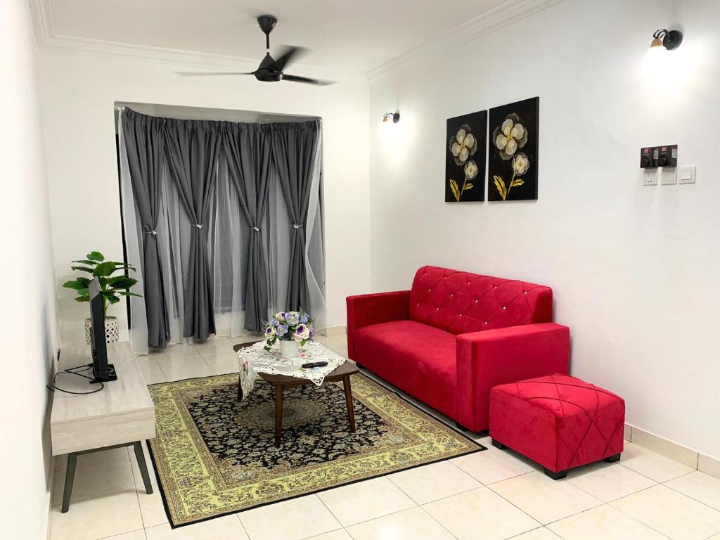 Χώρος καθιστικού στο Homestay Impian