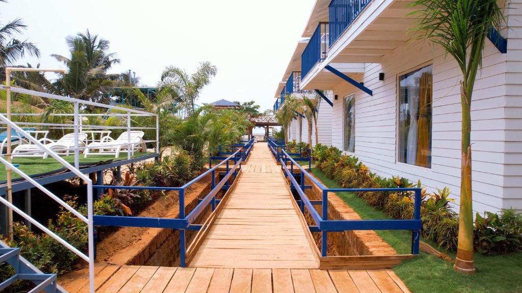 Zahrada ubytování Sandbanks Beach Villas, Morjim