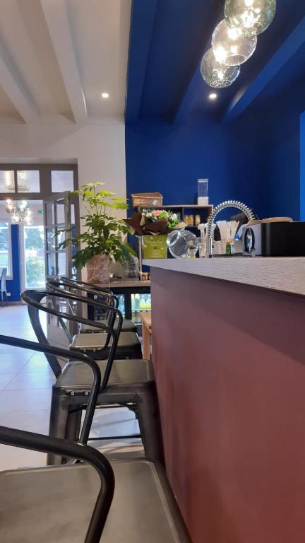 Posezení v ubytování Logis Hôtel Restaurant Le 1050