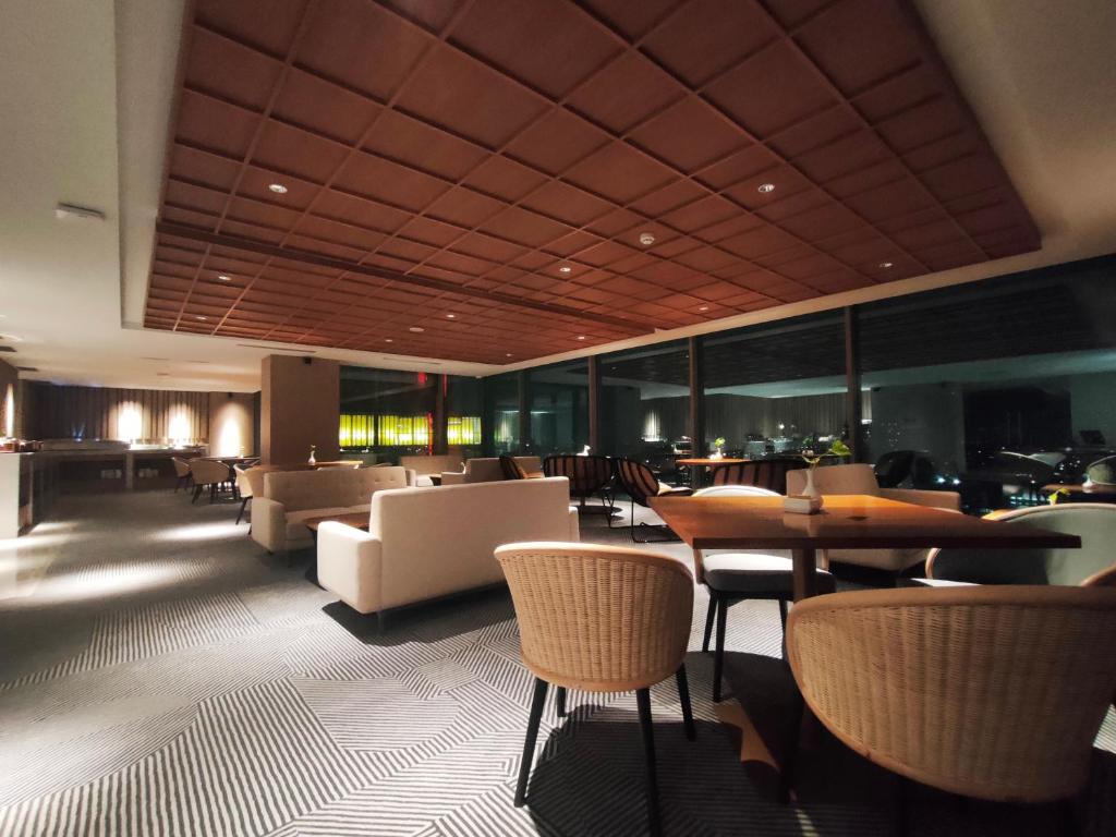Posezení v ubytování Ra Suites Simatupang