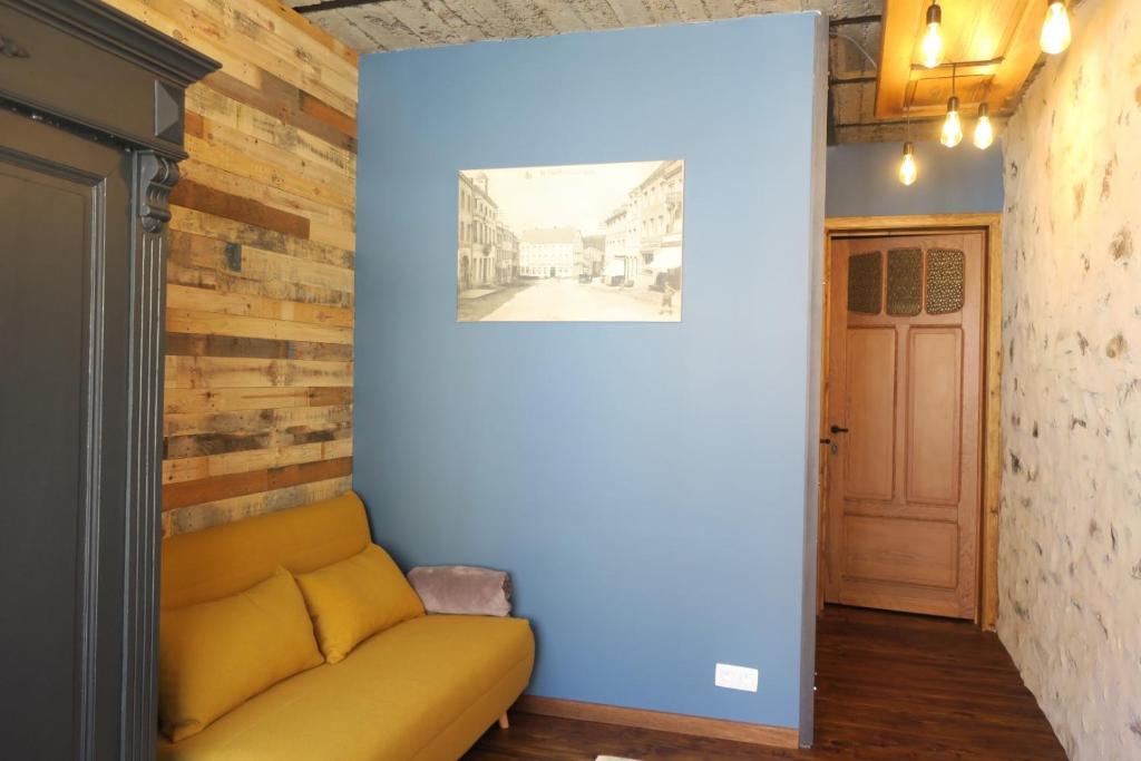 Posezení v ubytování L'Atelier - Gîte urbain chaleureux