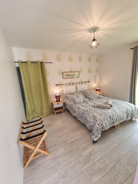 Postel nebo postele na pokoji v ubytování Gîte Camaloth - Closeries du Golfe