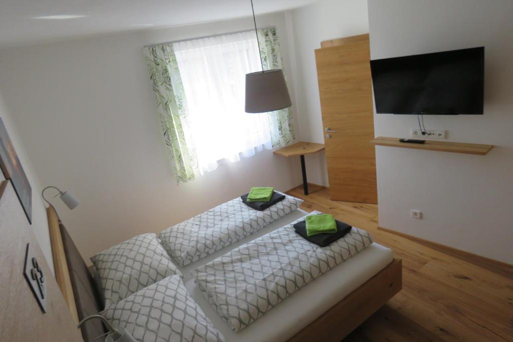 Postel nebo postele na pokoji v ubytování Gasthof Schmidt