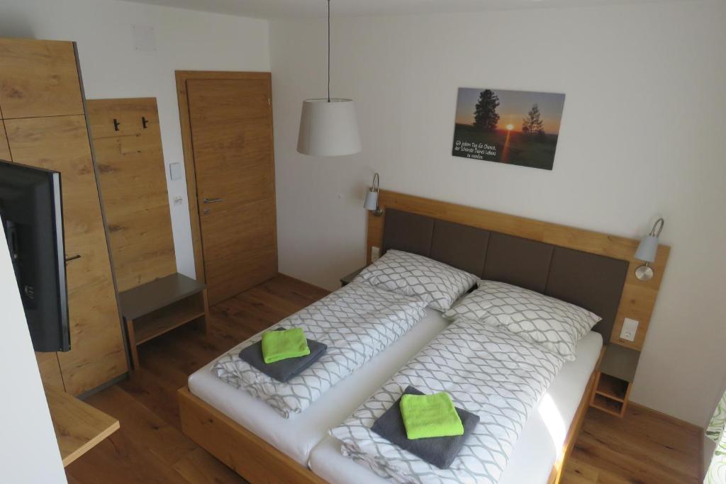 Postel nebo postele na pokoji v ubytování Gasthof Schmidt