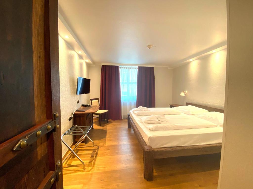 Una cama o camas en una habitación de Hotel Enziana Wien