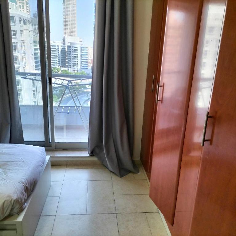 Postel nebo postele na pokoji v ubytování Amazing apartment 2 bed rooms in Tecom 6 pax