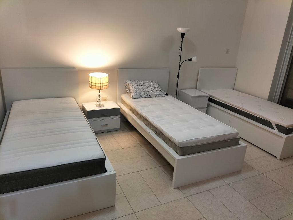 Postel nebo postele na pokoji v ubytování Amazing apartment 2 bed rooms in Tecom 6 pax