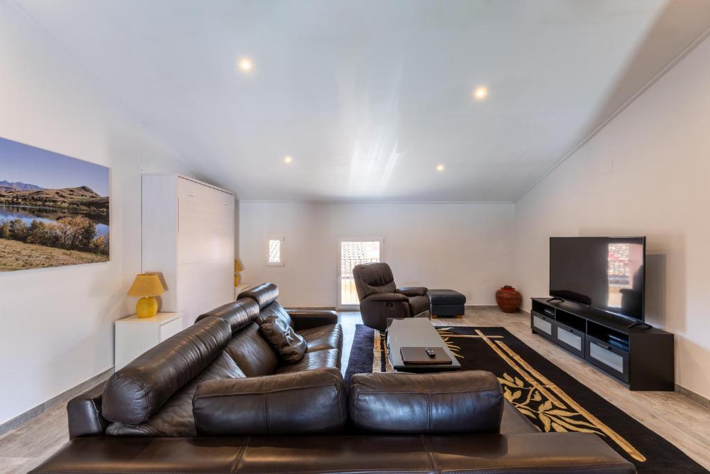 A seating area at Penthouse Duplex 4 PAX by costablancarent