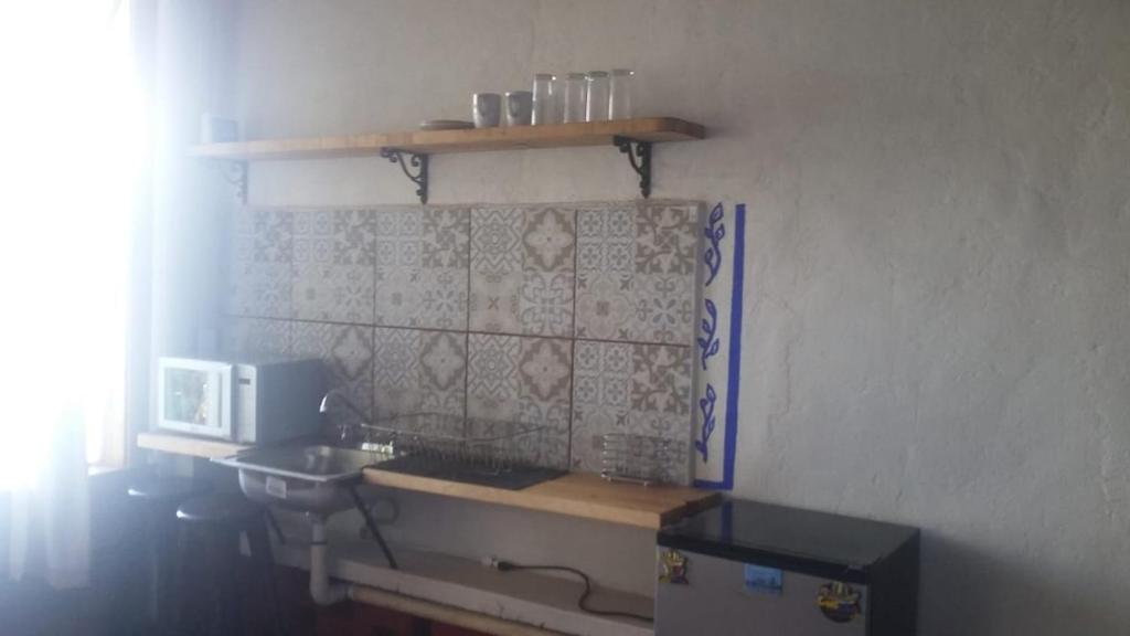 Kuchyň nebo kuchyňský kout v ubytování Cabaña Aurora