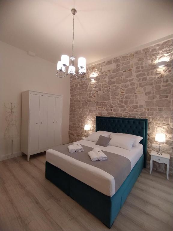 Posteľ alebo postele v izbe v ubytovaní Apartment Antique Zadar - City Center