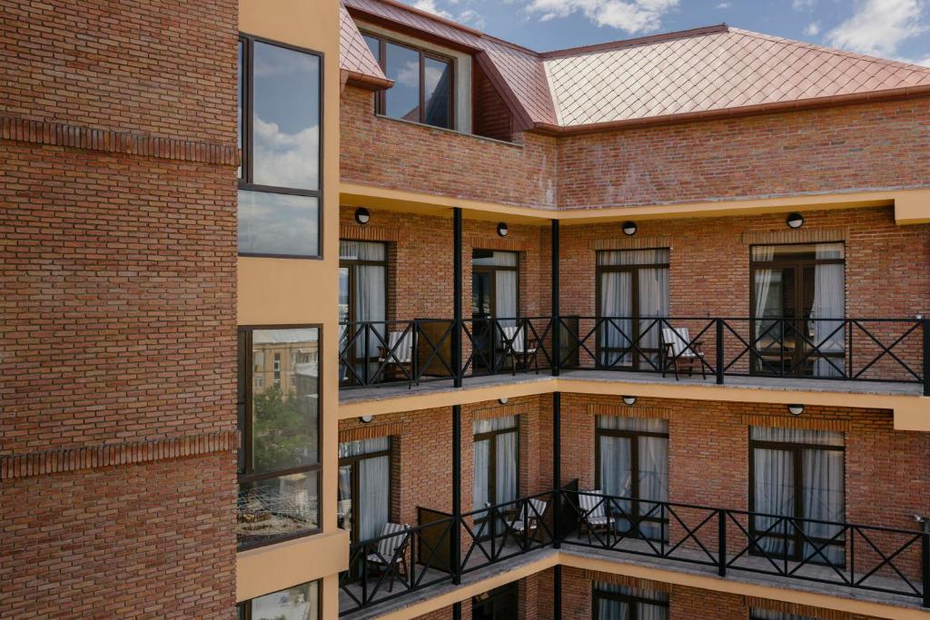 Balkón nebo terasa v ubytování GINGER Hotel