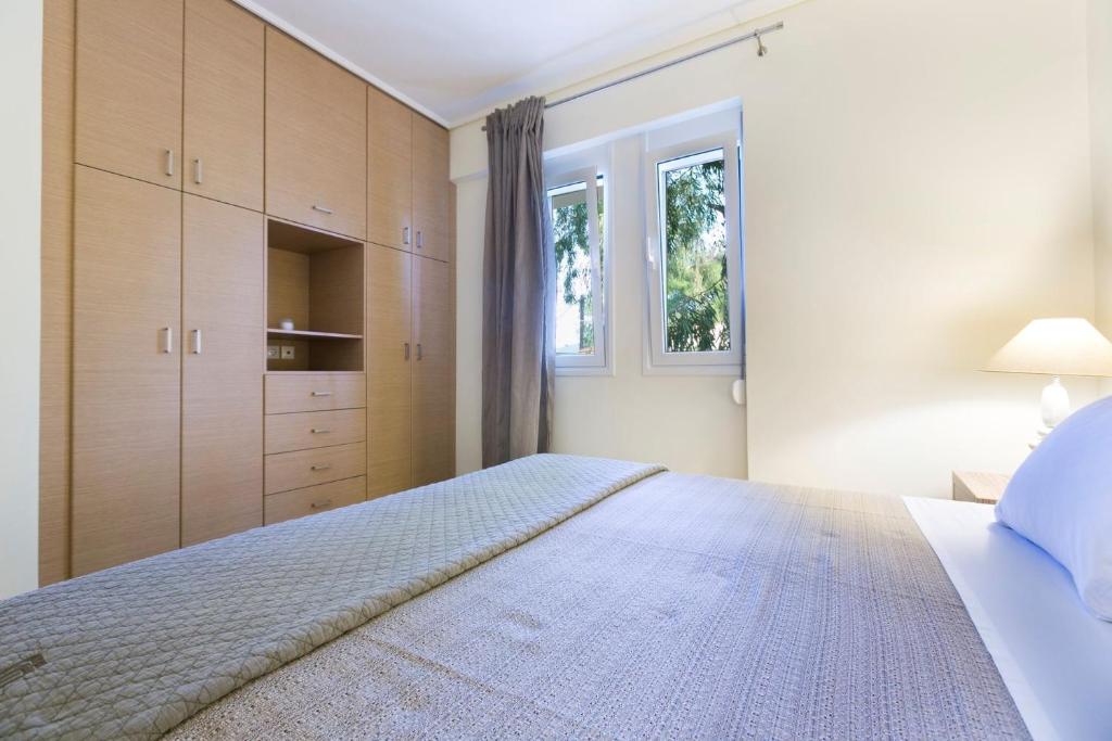 Łóżko lub łóżka w pokoju w obiekcie Eucalyptus Apartments Apartment Meli