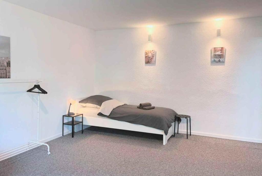Postel nebo postele na pokoji v ubytování Holiday Apartments Brachttal