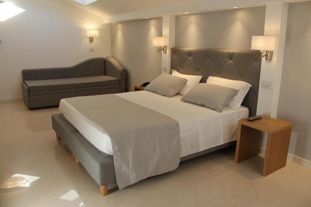 Posteľ alebo postele v izbe v ubytovaní Hotel Nazionale