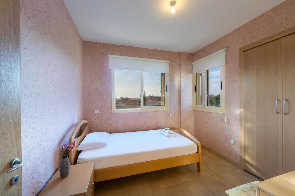 Postel nebo postele na pokoji v ubytování Pelagos apartment 6