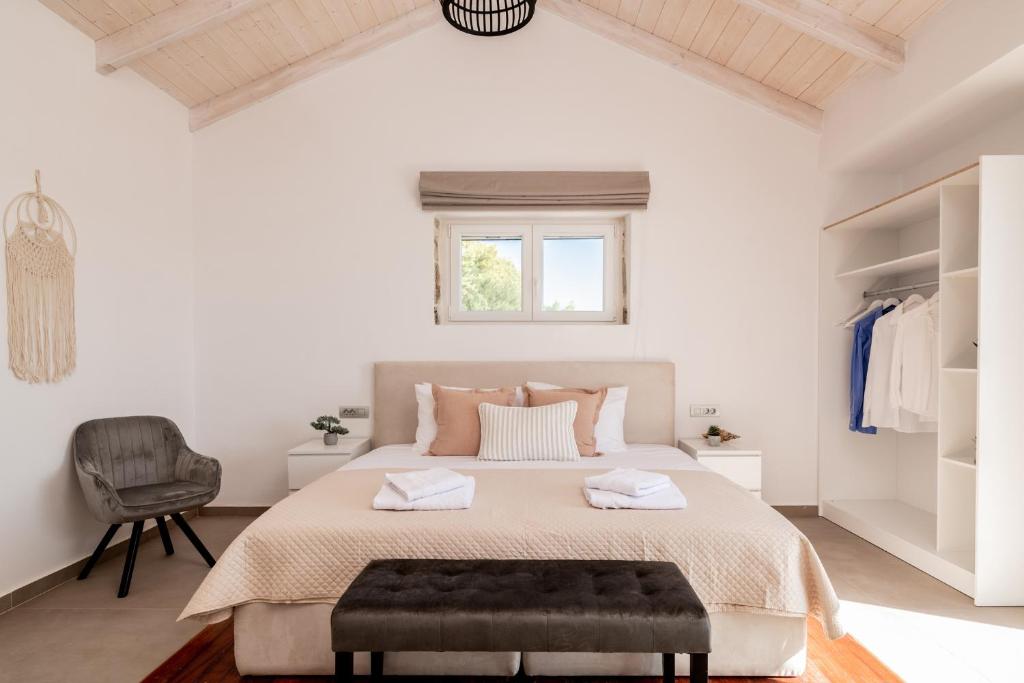 Postel nebo postele na pokoji v ubytování Villa di Pietra