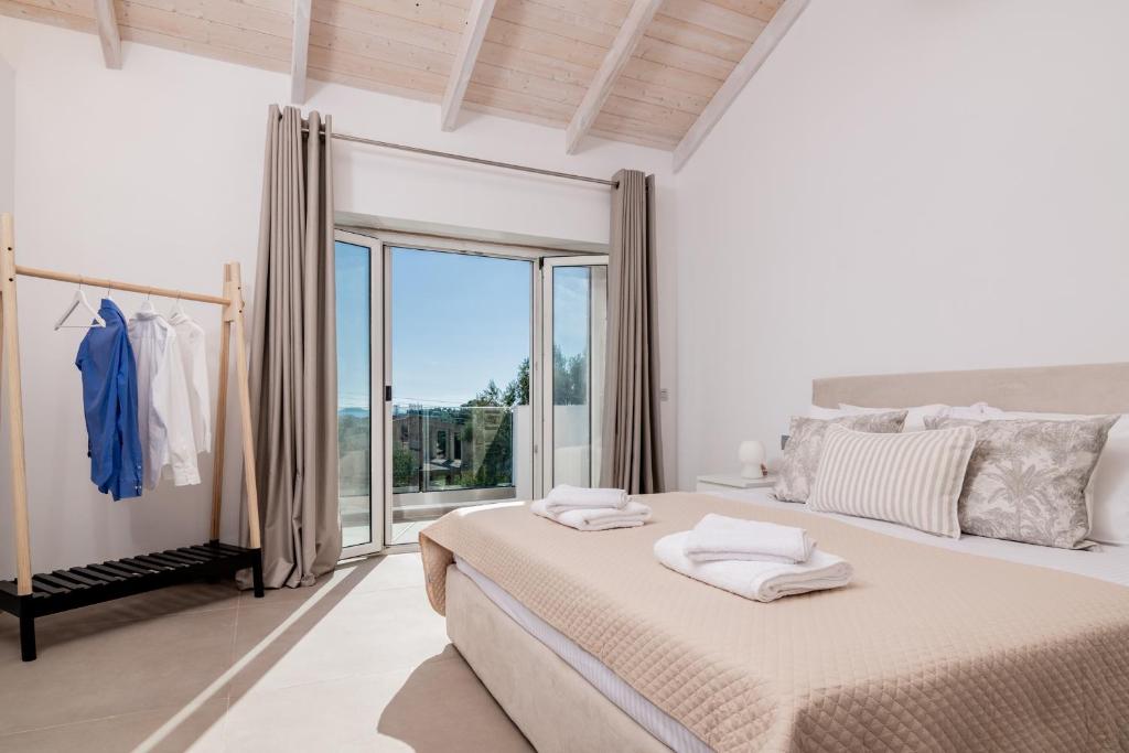 Postel nebo postele na pokoji v ubytování Villa di Pietra