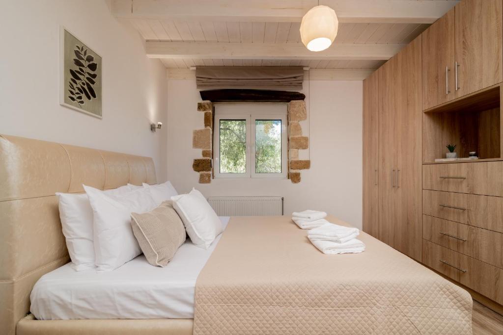 Postel nebo postele na pokoji v ubytování Villa di Pietra