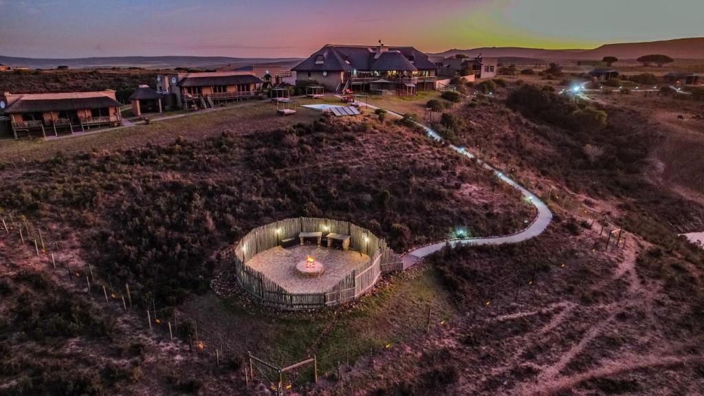 an overhead view of a house with a road leading to it at Hartenbos Private Game Lodge in Hartenbos