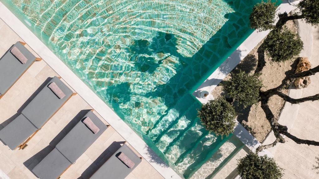 Bazén v ubytování Villa di Pietra nebo v jeho okolí