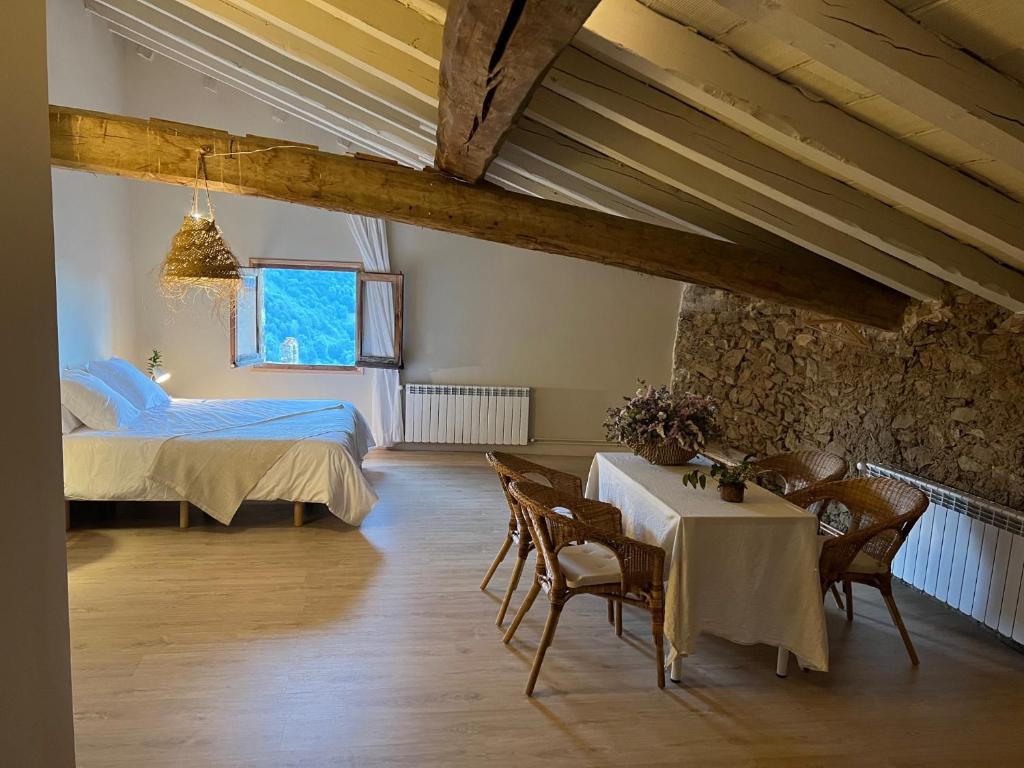 Postel nebo postele na pokoji v ubytování Casa Tapiolas Rectoría