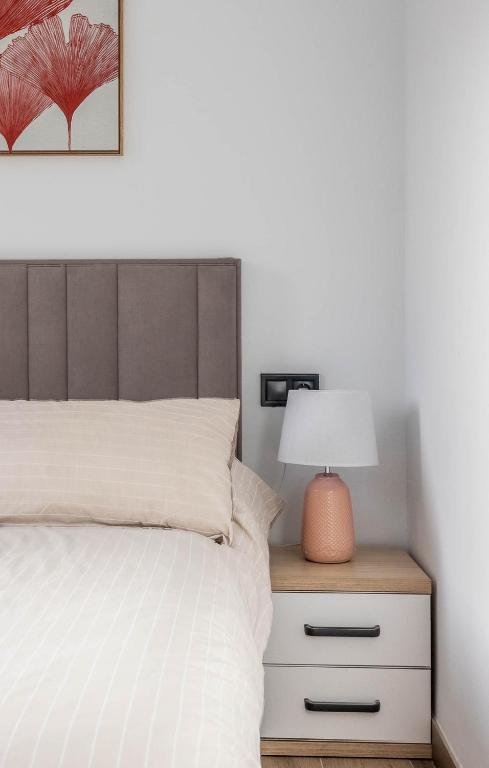 Posteľ alebo postele v izbe v ubytovaní Nervión Suites 2 - Vacacional Sevilla