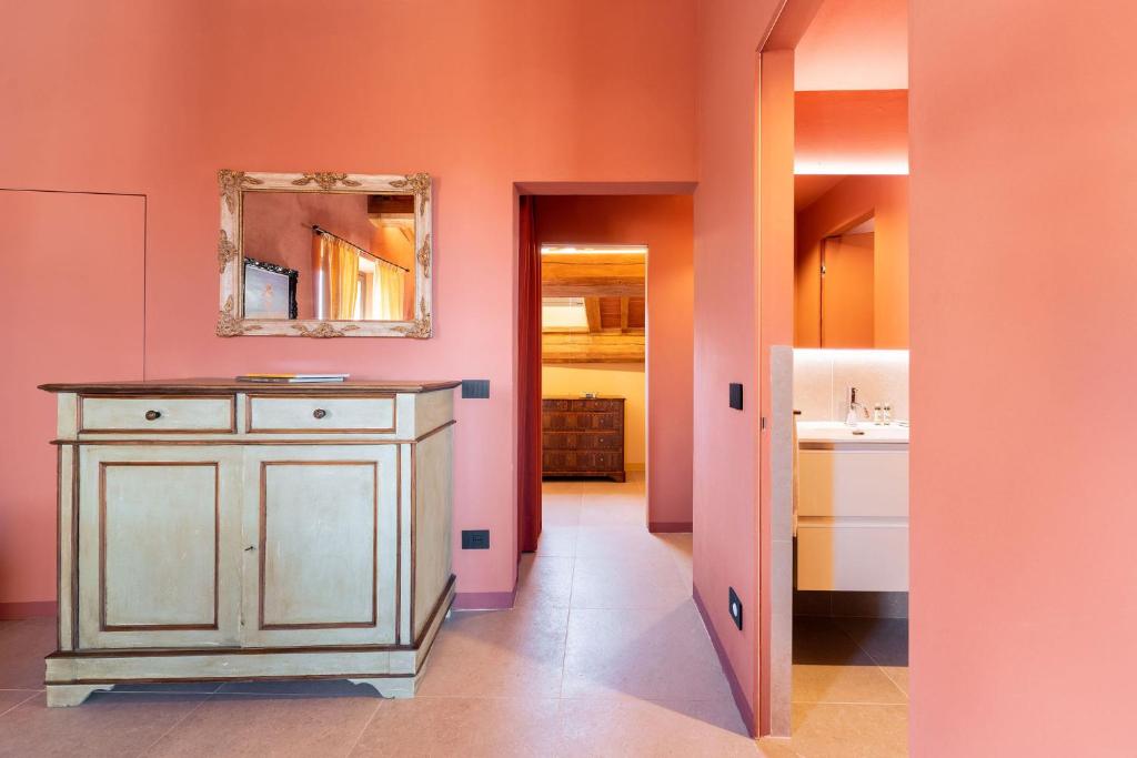 Posteľ alebo postele v izbe v ubytovaní Sdrucciolo dei Pitti Fourth floor